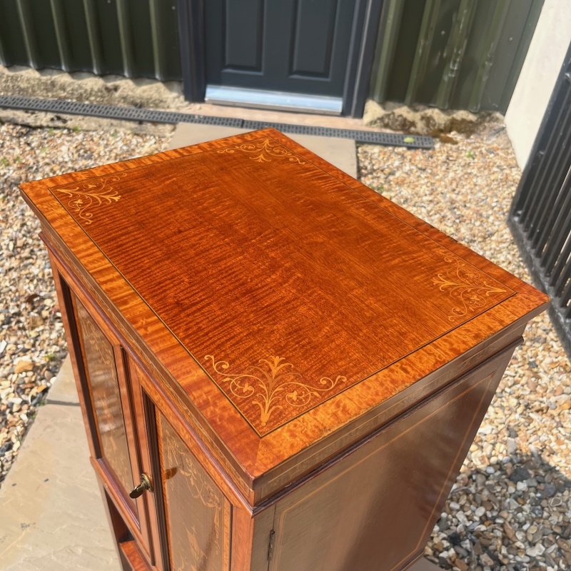 A Fine Quality Edwards and Roberts Of London marquetry inlaid music cabinet